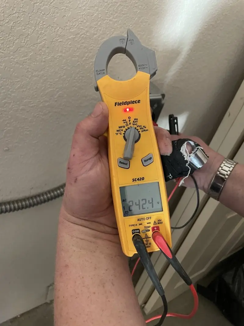 Voltage testing with clamp meter during Electrical Installation Services in Reisterstown